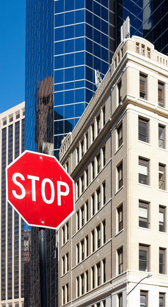 Stop sign on a street of New York City.