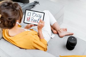 Woman decides between buying or renting house